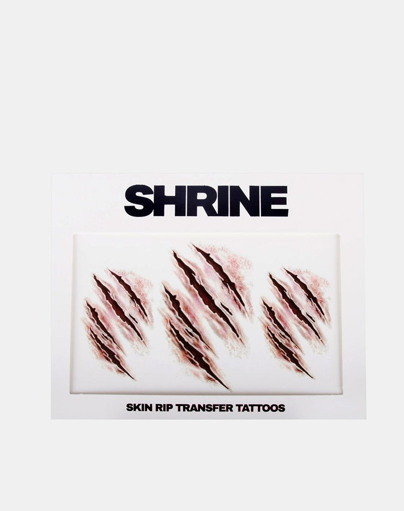 Skin Rip Transfer Tattoo by Shrine