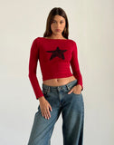 Image of Amabon Long Sleeve Top in Adrenaline Red with Black Star