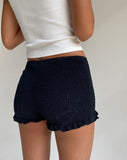 Image of Ritala Ruched Detail Frill Hem Hot Pants in Black