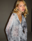 Image of Cecelia Ruffle Detail Blouse in Distorted Animal Print