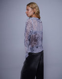 Image of Cecelia Ruffle Detail Blouse in Distorted Animal Print