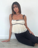 Image of Damaris Frill Cami Top in Cream with Black Centre Bow