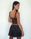 Image of Habema Wrap Mini Skirt in Satin Black