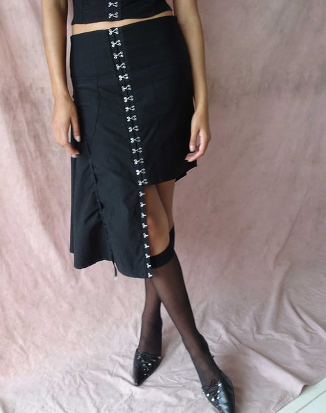 Image of Carlisia Asymmetrical Midi Skirt in Black