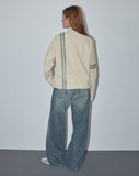 Image of Lewis Jacket in Cream PU with Blue Stripe