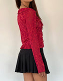 Image of Noemi Cardigan in Red Grunge Floral Flock