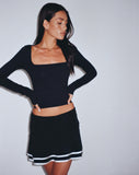 Image of Ranta Mini Skirt in Black with Ivory Binding