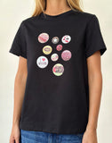 Image of Saki Tee in Black with Badges Graphic