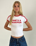 Image of Salda Tee in White with She's a Keeper and Tango Red Binding