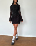 Image of Sevila Long Sleeve Mini Dress in Black Queen of Heart Flock