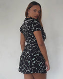 Image of Sulani Mini Dress in Black with Pearl and Bow Print