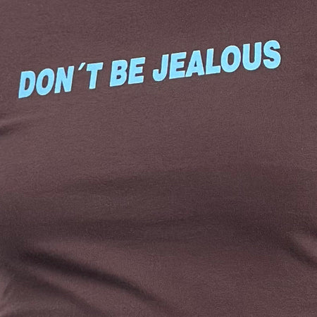 Sutin Baby Tee in Deep Mahogany with Don't Be Jealous Slogan
