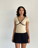 Image of Tasina Top in Coconut Milk with Black Binding