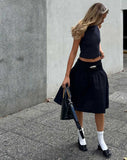 image of MOTEL X JACQUIE Neleta Shirred Waist Midi Skirt in Black