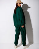 Image of Glo Sweatshirt in Bottle Green with Take Care Of Yourself Embro