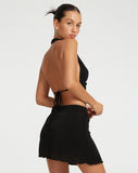 image of Junia Wrap-Over Mini Skirt in Black