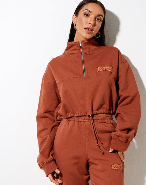 Nar Zip Bungee Jumper in Burnt Brick 'Be Nice' Label Embro