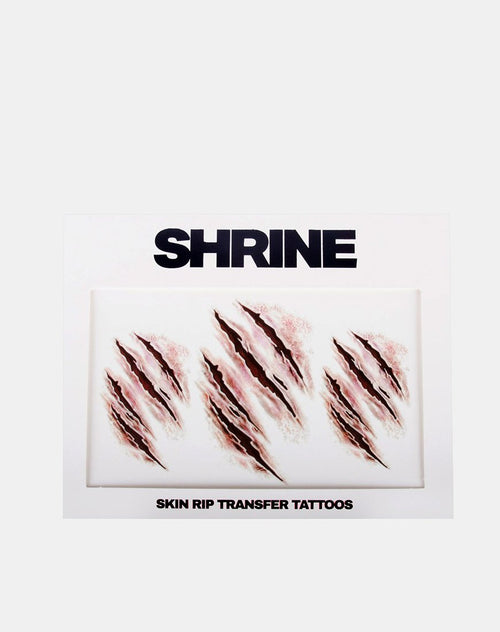 Skin Rip Transfer Tattoo by Shrine