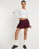 image of Zabini Low Rise Pleated Mini Skirt in Burgundy with Ecru Stitch Detail