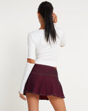 image of Zabini Low Rise Pleated Mini Skirt in Burgundy with Ecru Stitch Detail